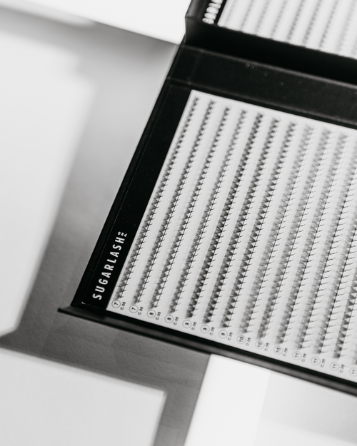 Close up of an open tray of VOL-X Pre-made fans for volume eyelash extensions.