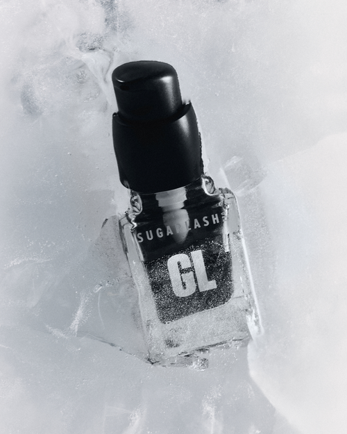 A bottle of Glaze covered in frosted ice.