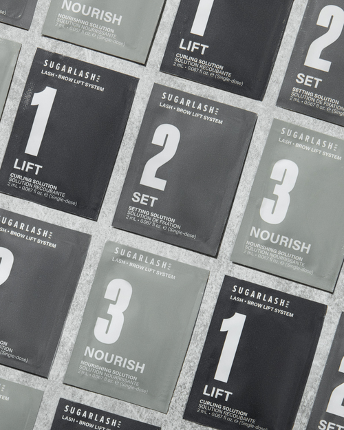 Layout of multiple Lift, Set, and Nourish Lash and Eyebrow Lamination sachets.