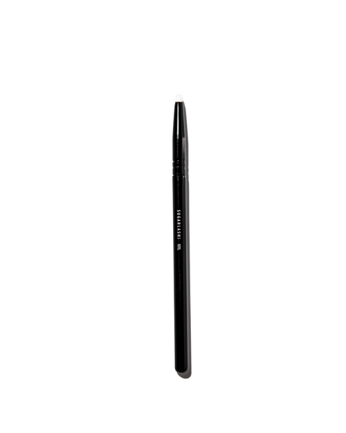 Lash Lift Brush against a white background.