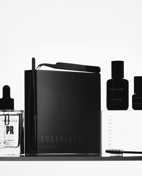 image of mini lash lift kit with tweezers, gel remover, pads, mascara wands, lash glue