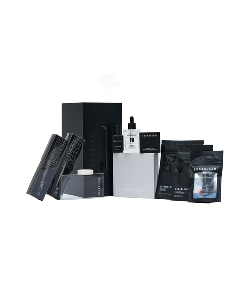 image of mini lash lift kit with tweezers, gel remover, pads, mascara wands , lash glue