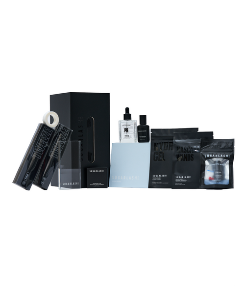 Mini eyelash extension kit of lash tweezers, wants, serum, gel remover, eye pads,
