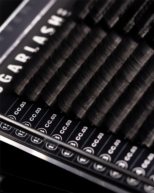 A close up of an open tray of Plush lashes for eyelash extensions.