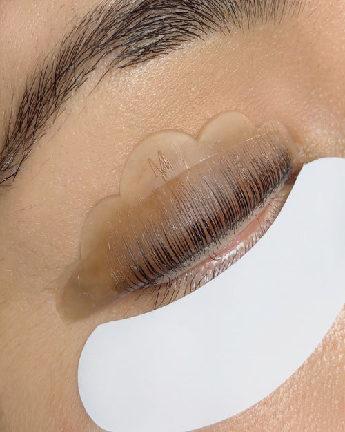 A close up of lashes pressed against a professional Lash Lift Shield.