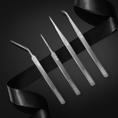 I-PRO, I-P, I-S, and I-45 tweezers beside each other for eyelash extensions