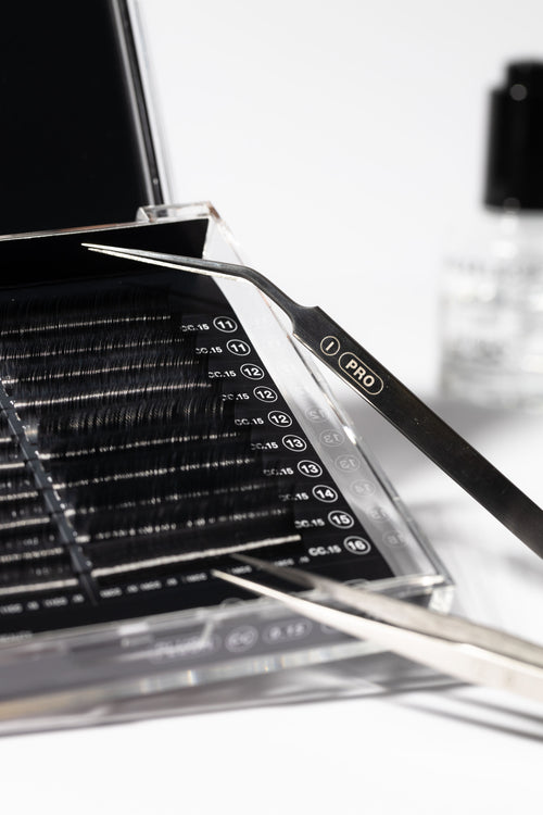 I-PRO eyelash extension Isolation Tweezer in a lash tray.