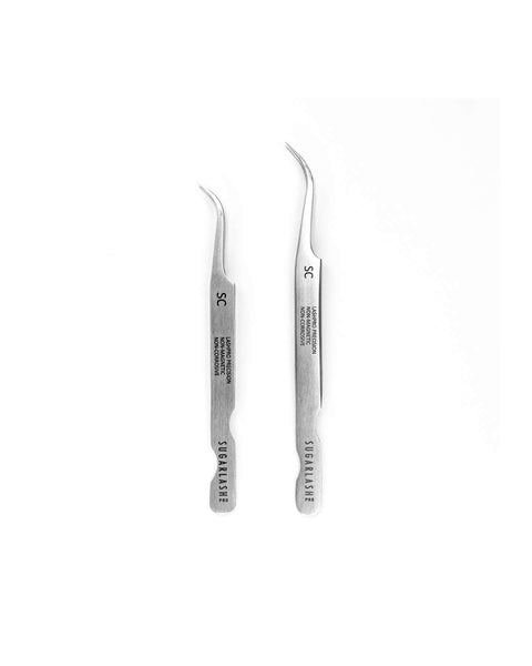Two Standard Curved eyelash extension Tweezers beside each other.